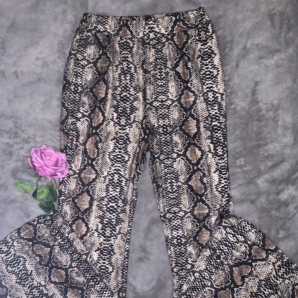 Snakeskin print flare or wide leg pants